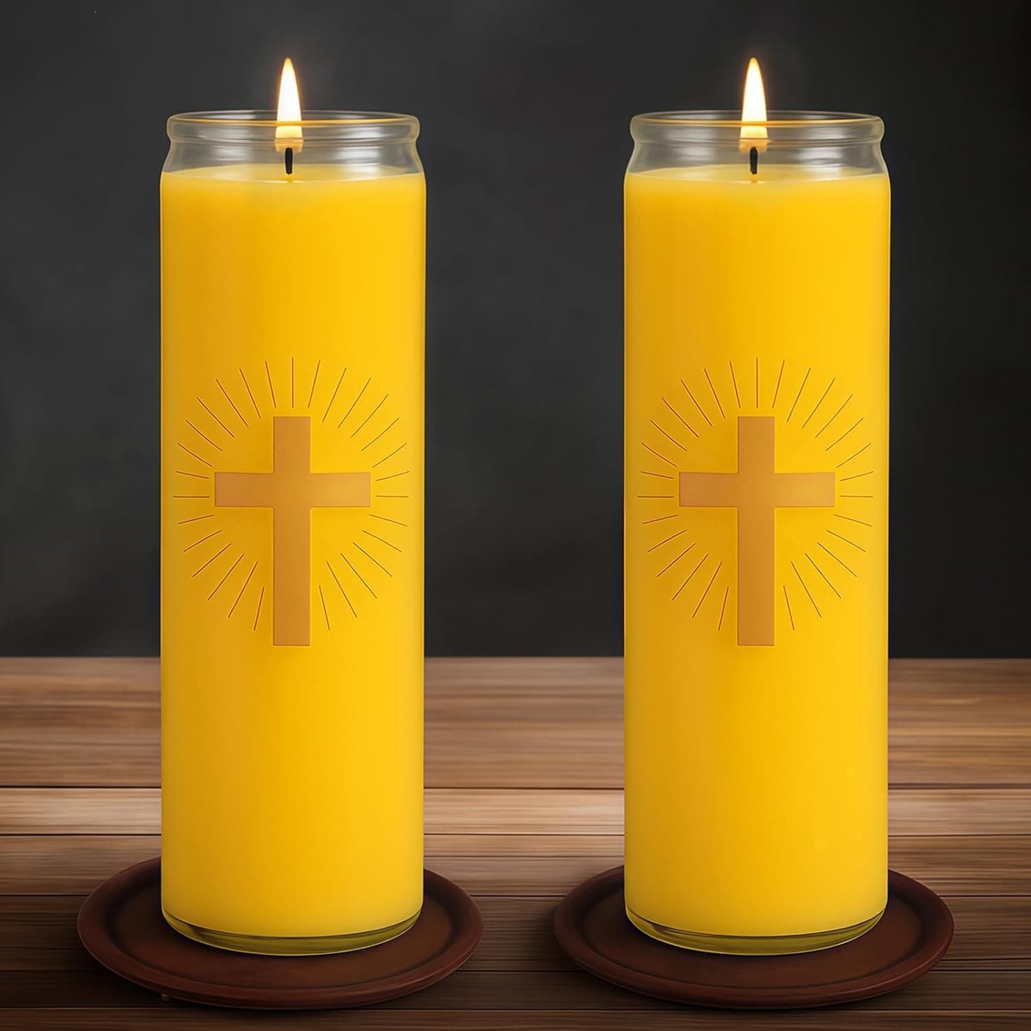 Two Anovia devotional candles lit, with gold cross artwork